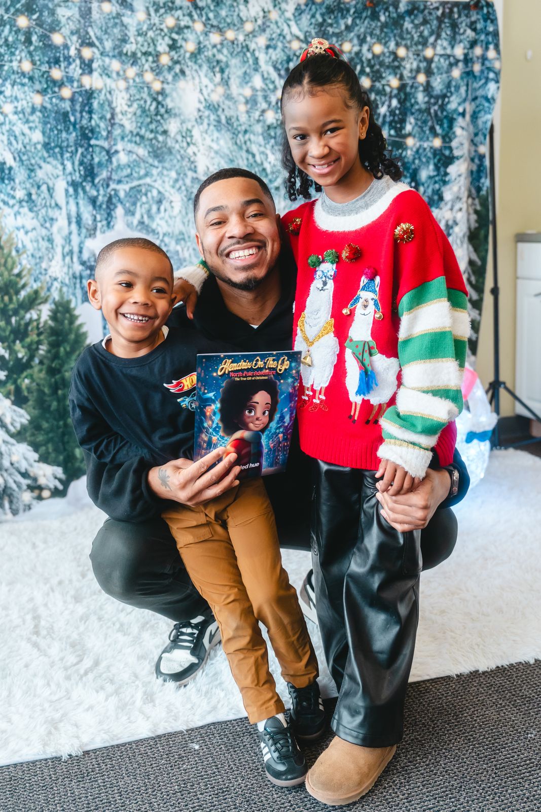 Rashiid Marcell with his two kids